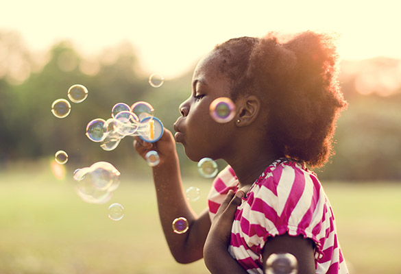 Girl Blowing Bubbles