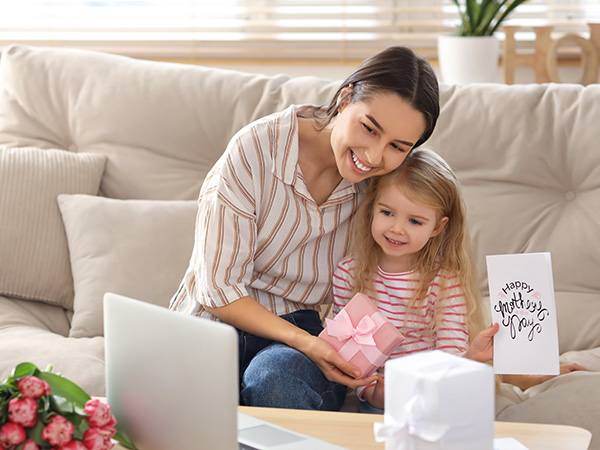 Mother and Daughter calling Grandma for Mothers Day